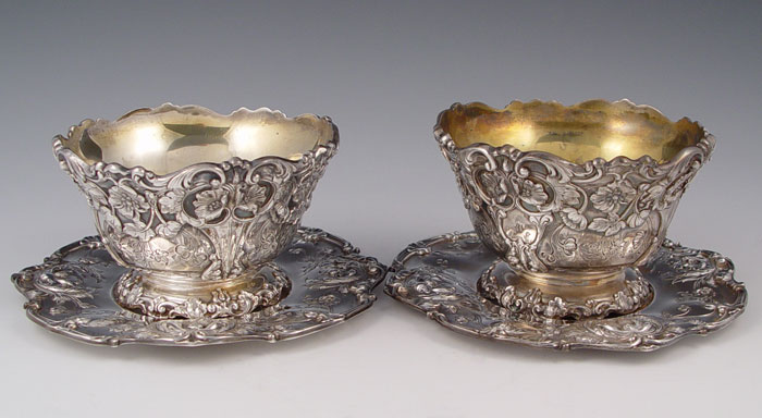 Appraisal: PAIR REED BARTON STERLING CHASED BOWLS PLATES Identical pair pattern