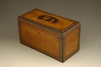 Appraisal: A Sorrento ware tea caddy olive wood veneered with a