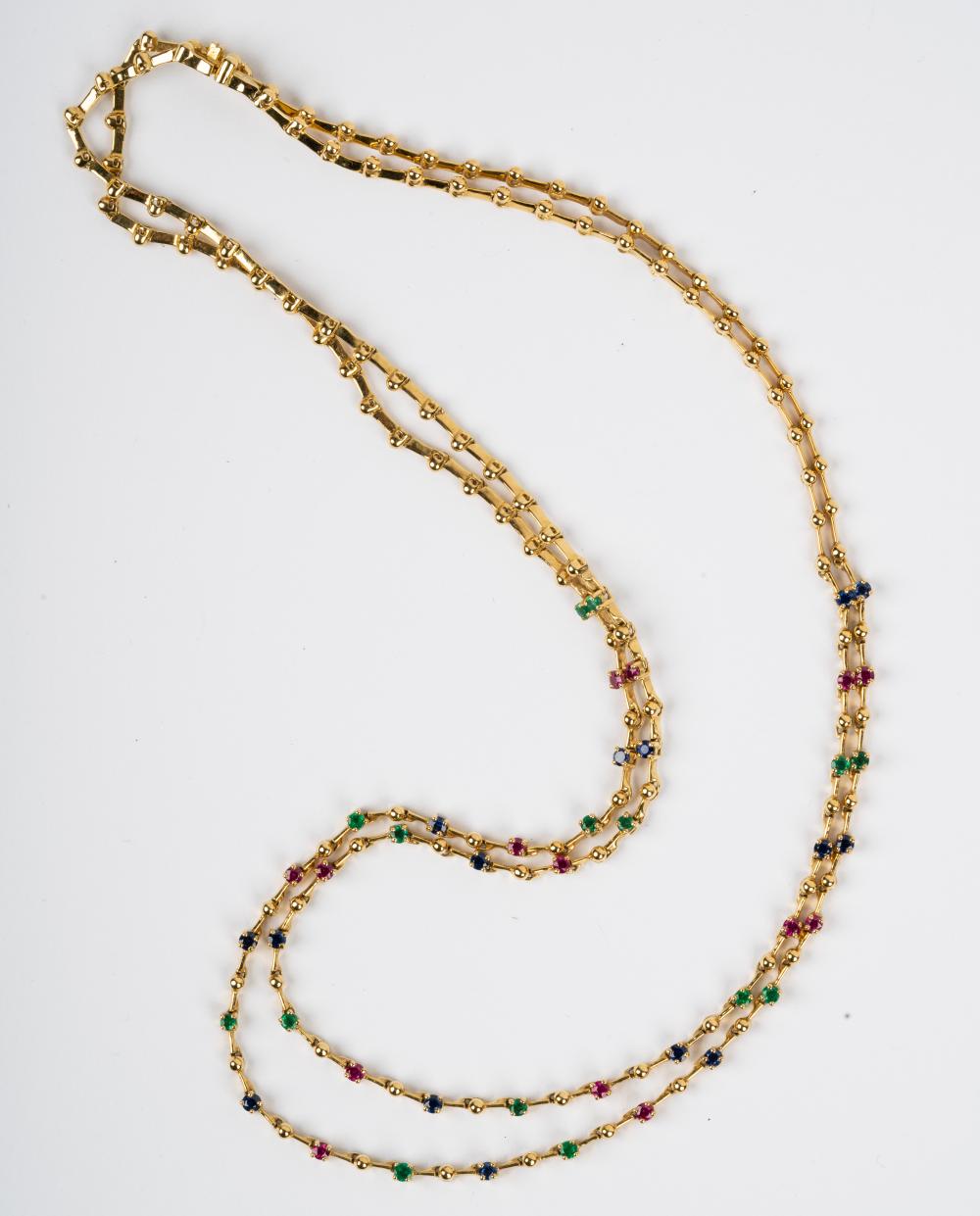 Appraisal: KARAT YELLOW GOLD SAPPHIRE EMERALD RUBY NECKLACEthe two-strand necklace containing