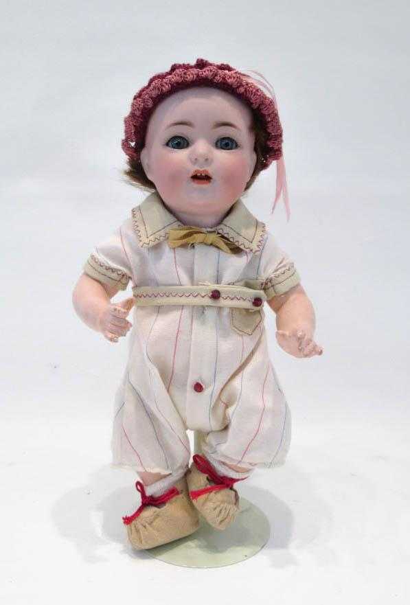 Appraisal: KAMMER AND REINHARDT BISQUE DOLL Marks K R Simon Halbig