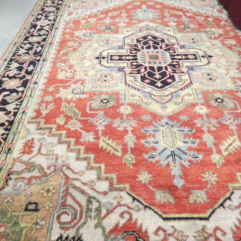 Appraisal: Heriz Persian Handmade Rug grand central medallion salmon field '