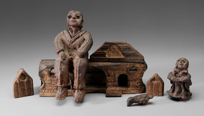 Appraisal: African-American Dollhouse Figures probably Southern th century molded brick house