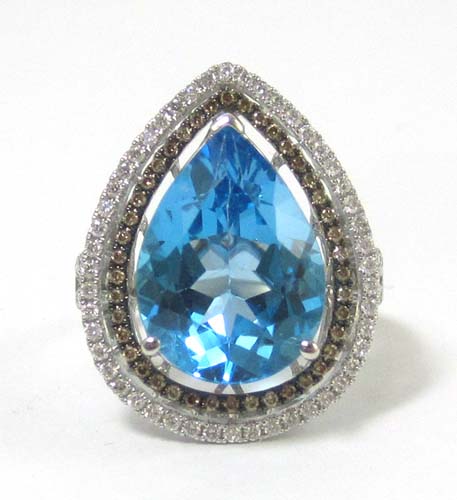 Appraisal: BLUE TOPAZ AND DIAMOND RING k white gold having round-cut