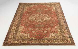 Appraisal: Hand knotted Sino-Isfahan wool rug having a lobed medallion with