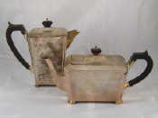 Appraisal: An Art Deco silver teapot and water jug each on