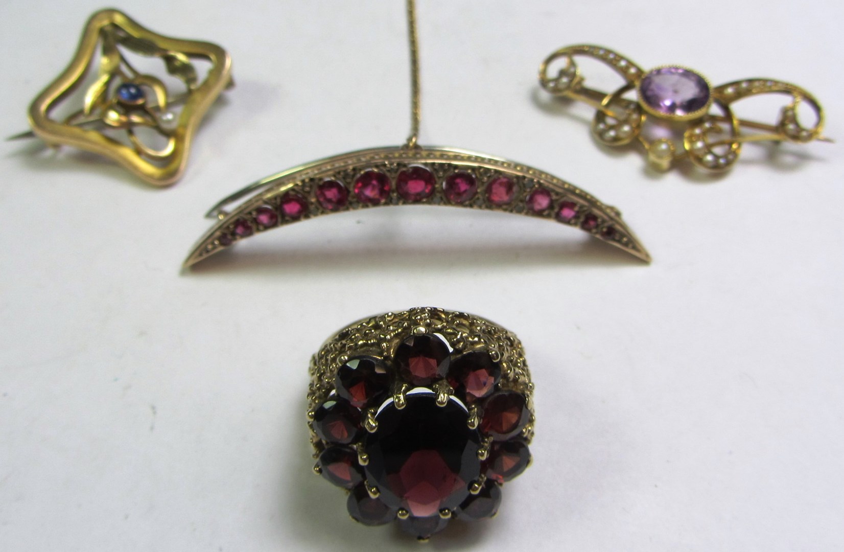 Appraisal: A gold amethyst and seed pearl set brooch detailed CT