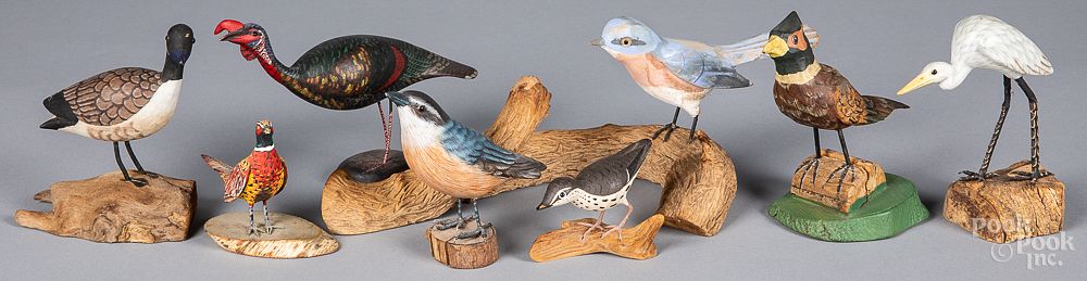 Appraisal: Eight carved and painted birds Eight carved and painted birds