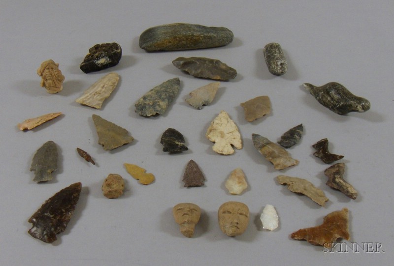 Appraisal: Arrowheads Clay Figural Fragments and Stone Animal Carvings including a