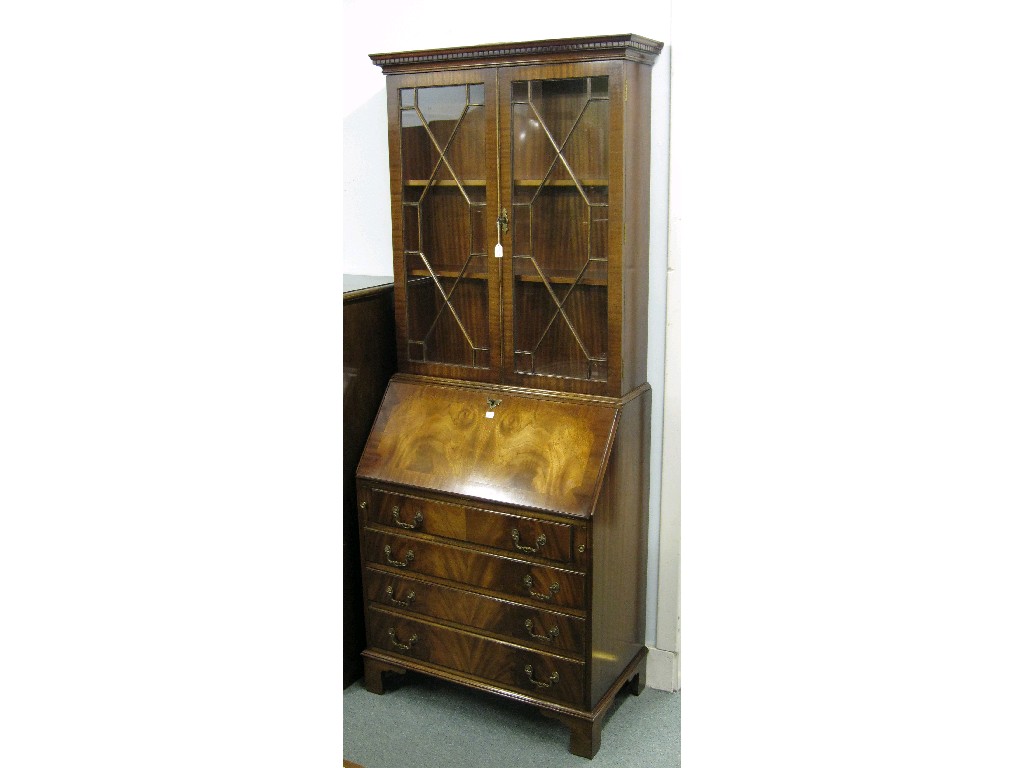 Appraisal: Reproduction mahogany bureau bookcase