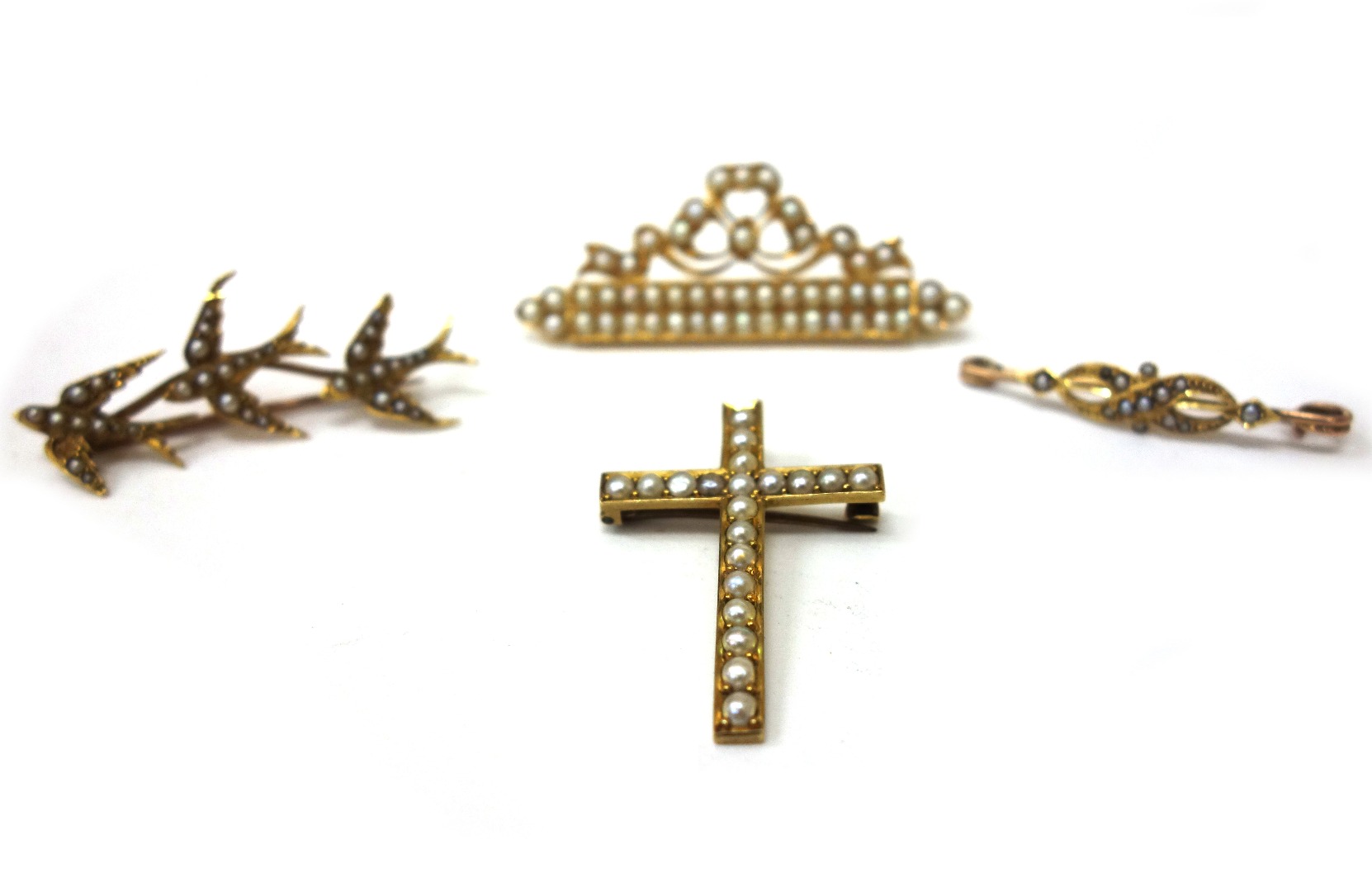 Appraisal: A collection of Edwardian gold and half pearl jewellery comprising