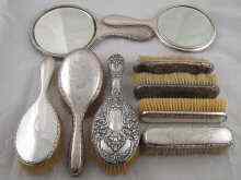 Appraisal: Two dressing table mirrors each with two matching brushes together