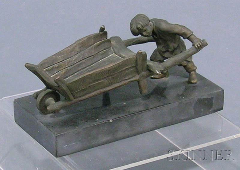 Appraisal: Small Russian Bronze Figure of a Boy Pushing a Wheelbarrow