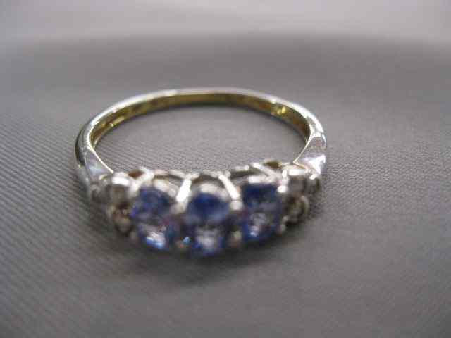 Appraisal: Tanzanite Diamond Ring fine oval gems totaling carat and six