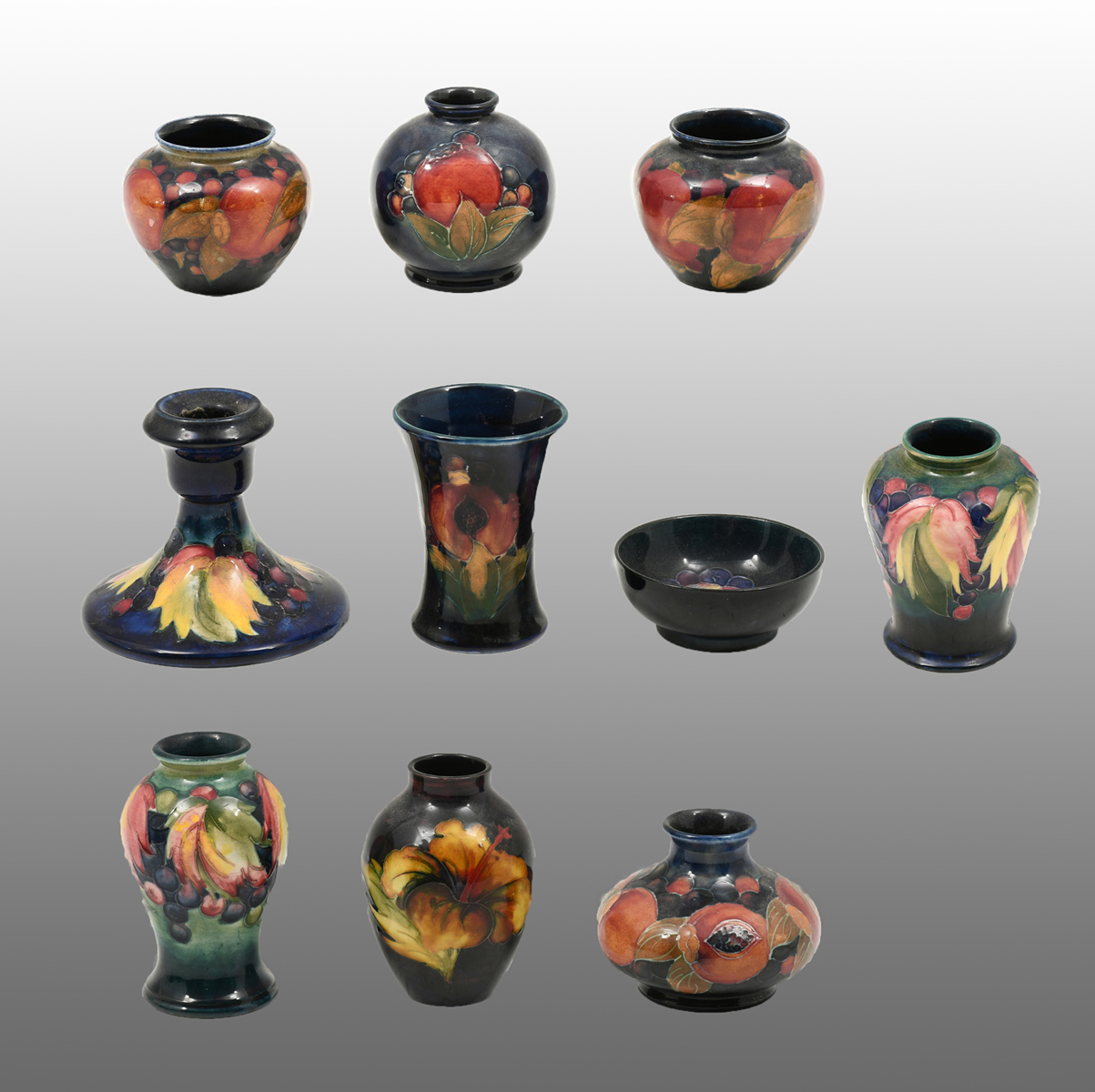 Appraisal: LARGE MOORCROFT PORCELAIN COLLECTION Comprising Pair of enameled vases having