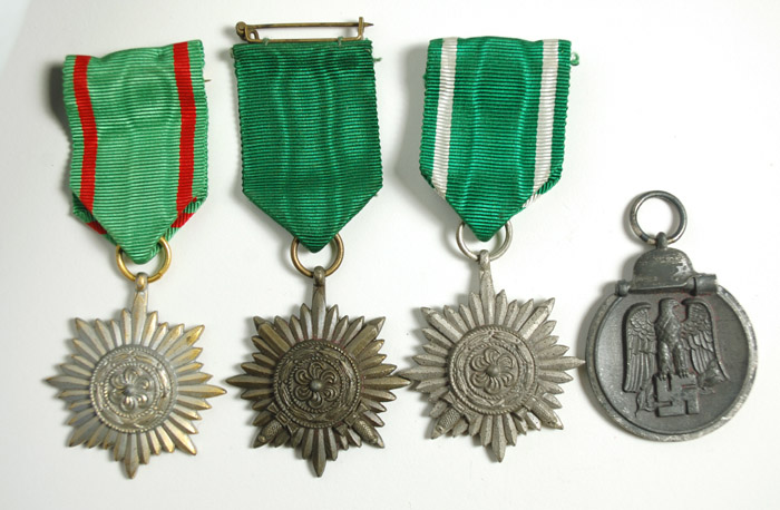 Appraisal: FOUR WORLD WAR TWO GERMAN MEDALS three are eastern peoples