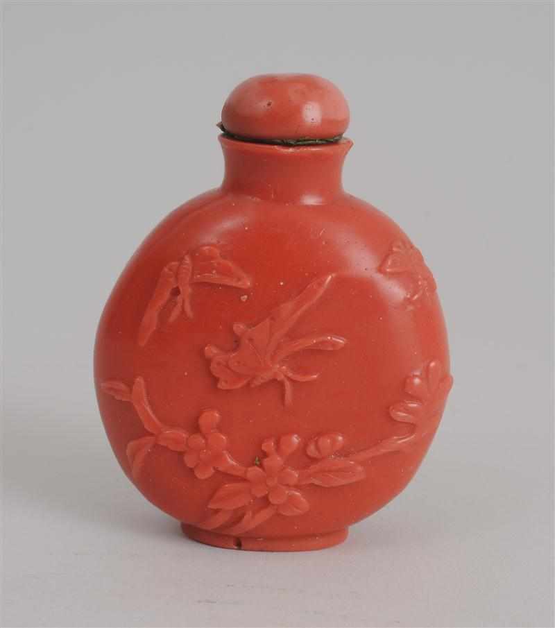 Appraisal: CHINESE CARVED CORAL SCENT BOTTLE WITH TOP Decorated with butterflies