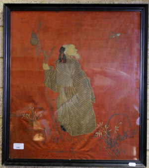 Appraisal: A Chinese embroidery of an immortal carrying a staff and