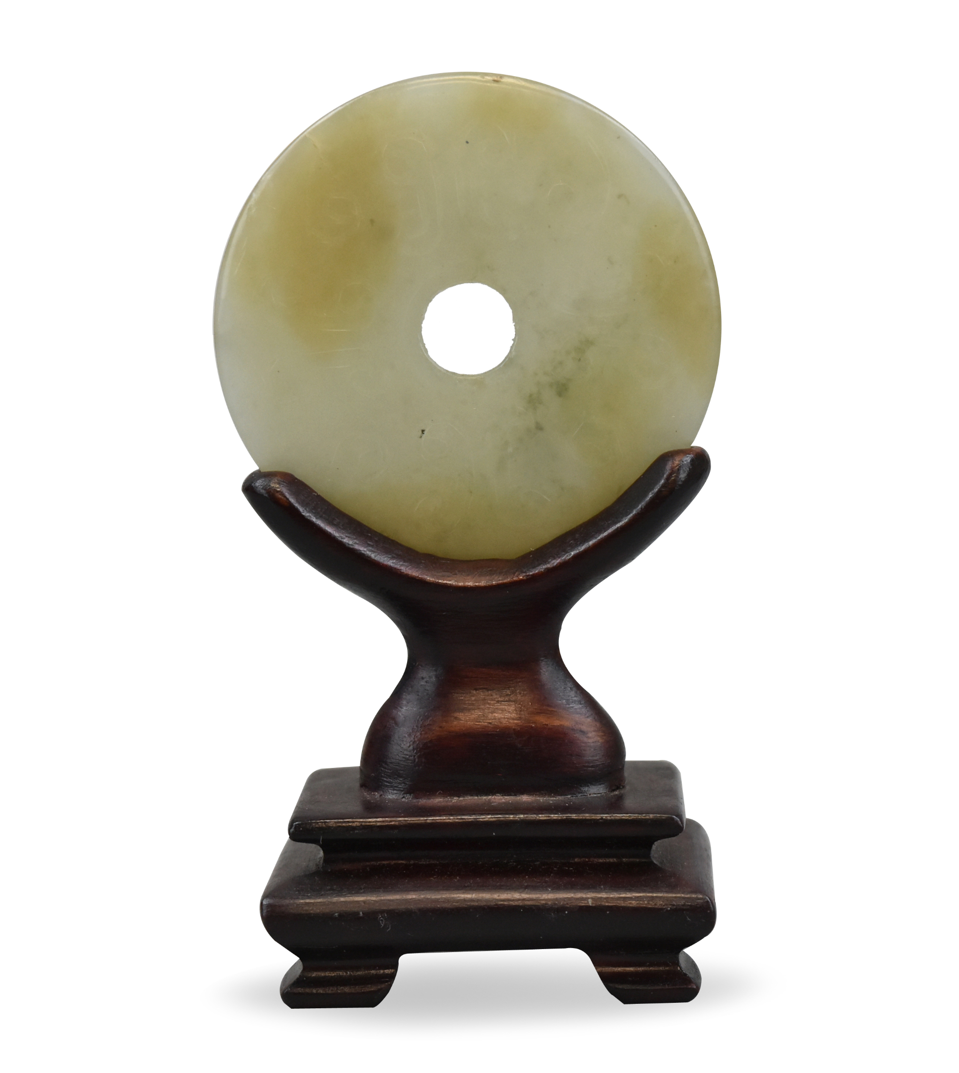 Appraisal: A carved Chinese jade Bi disc on wooden stand Both