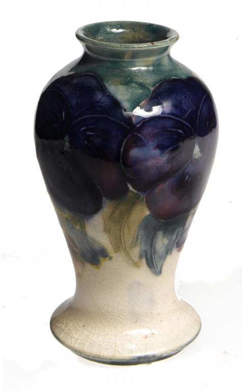 Appraisal: A MOORCROFT MINIATURE PANSY VASE DESIGNED BY WILLIAM MOORCROFT cm