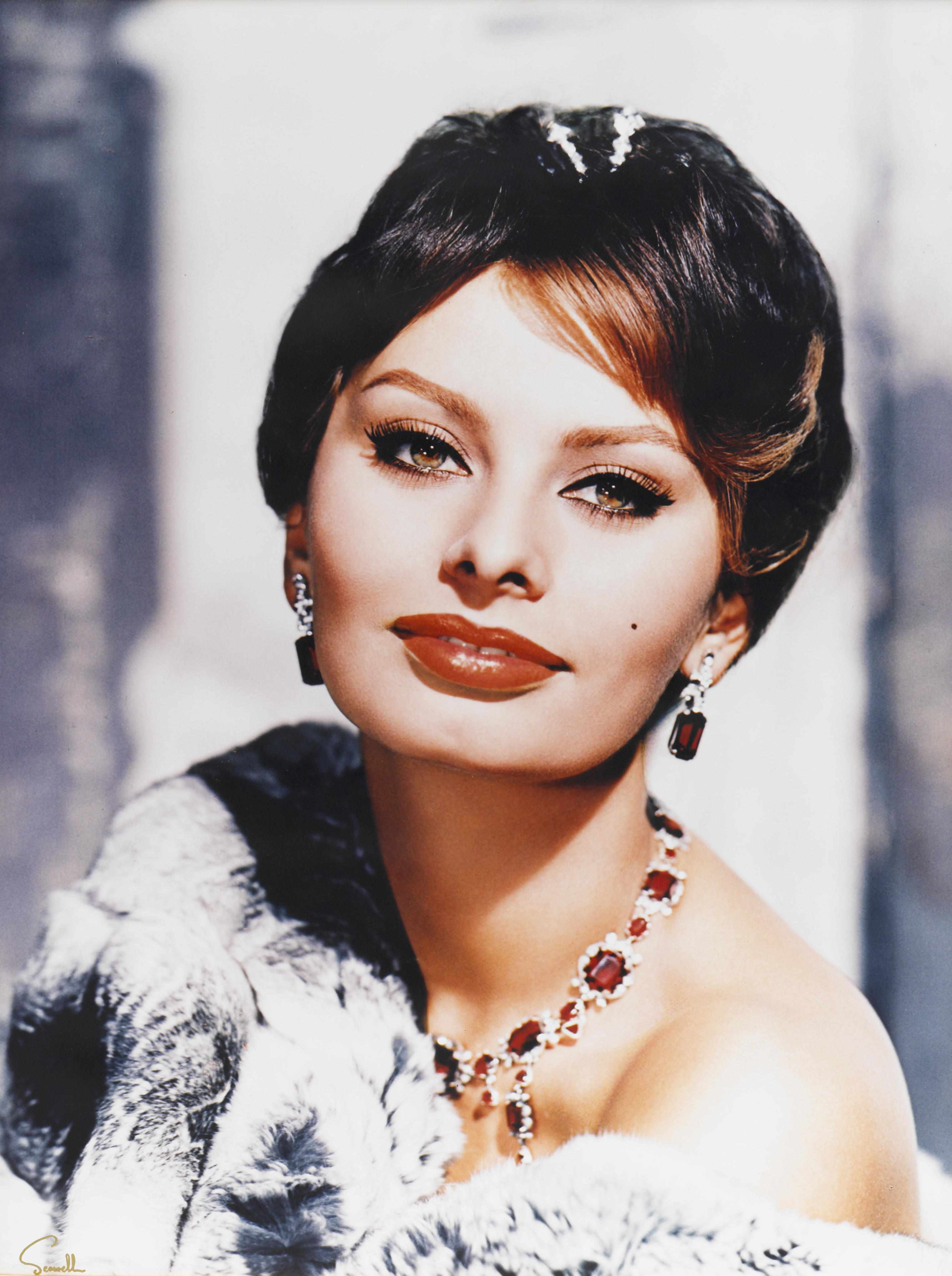 Appraisal: A pair of Sophia Loren large format color portraits by