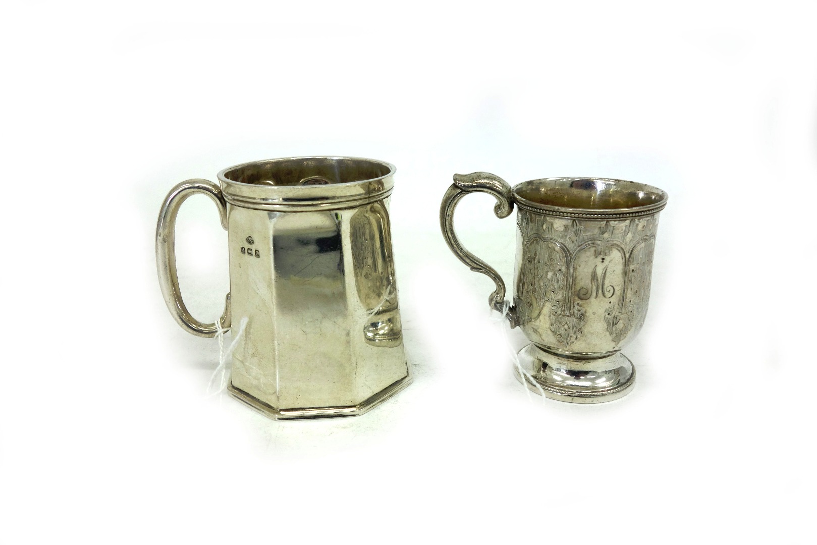 Appraisal: A George V silver octagonal tapering christening mug Adie Brothers