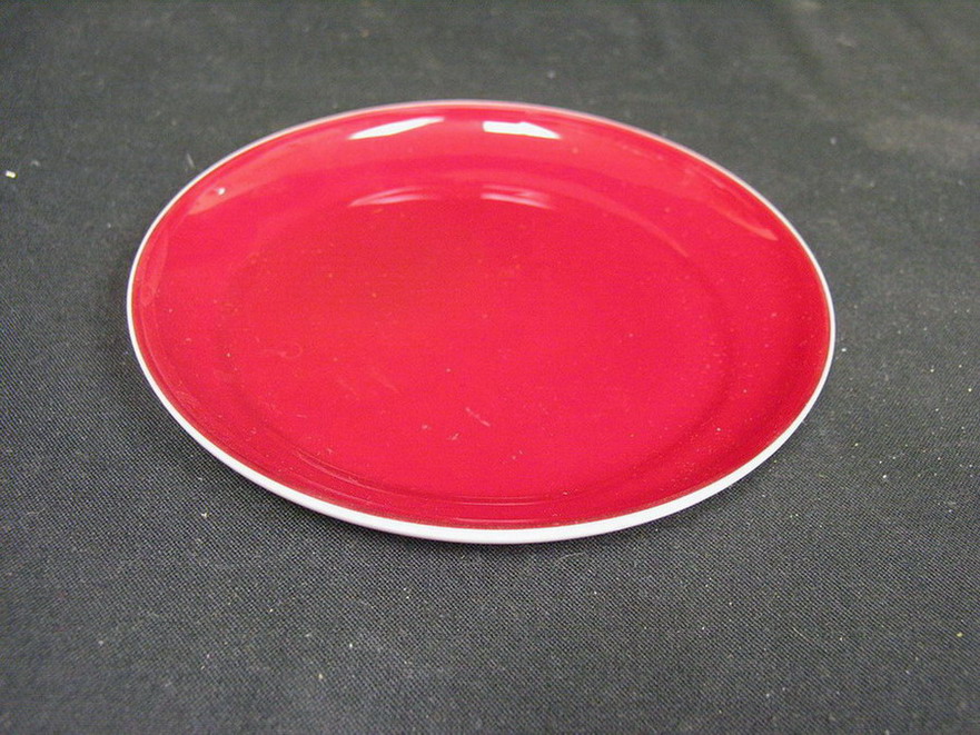 Appraisal: RED AND WHITE CASED ART GLASS PLATES Handmade art glass