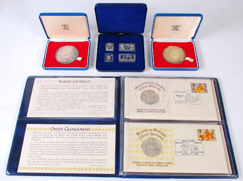 Appraisal: MIXED LOT COMPRISING TWO LARGE SILVER COMMEMORATIVE MEDALLIONS a folder