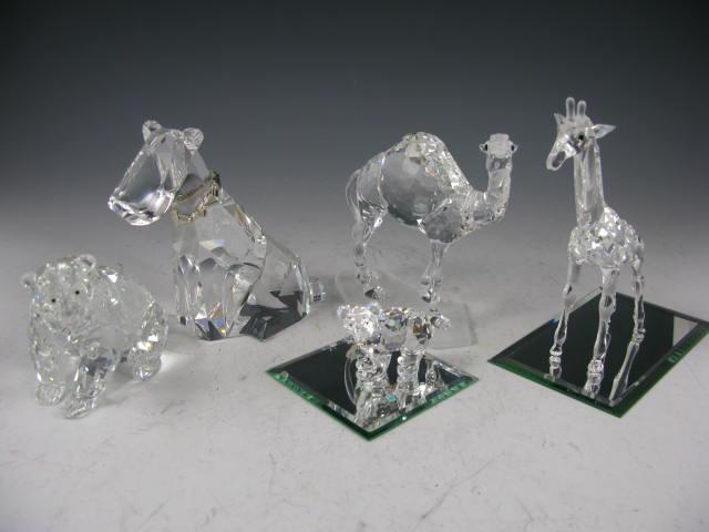 Appraisal: Five Swarovski Crystal Animals camel giraffe w ear repair dog