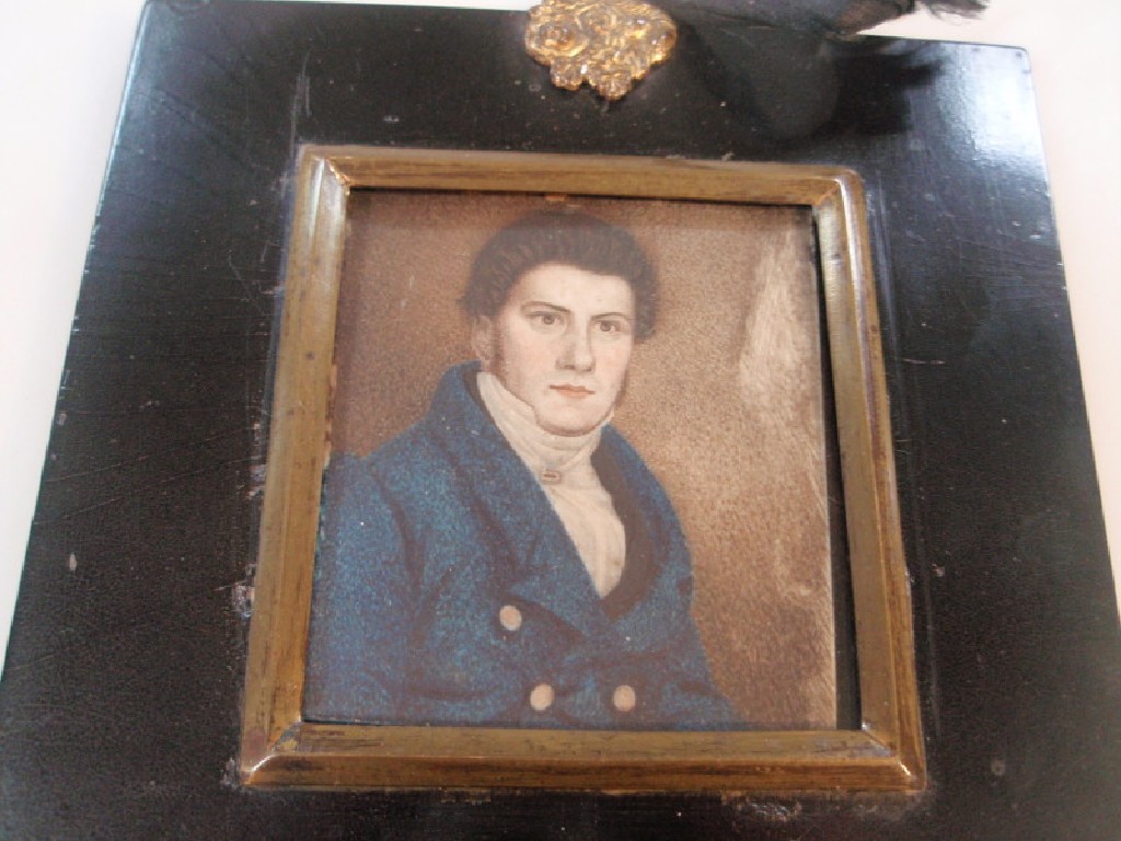 Appraisal: A thC portrait miniature of a half length gentleman wearing