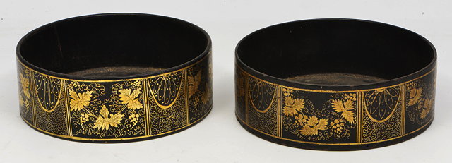 Appraisal: A PAIR OF TH CENTURY PAPIER MACHE WINE COASTERS decorated