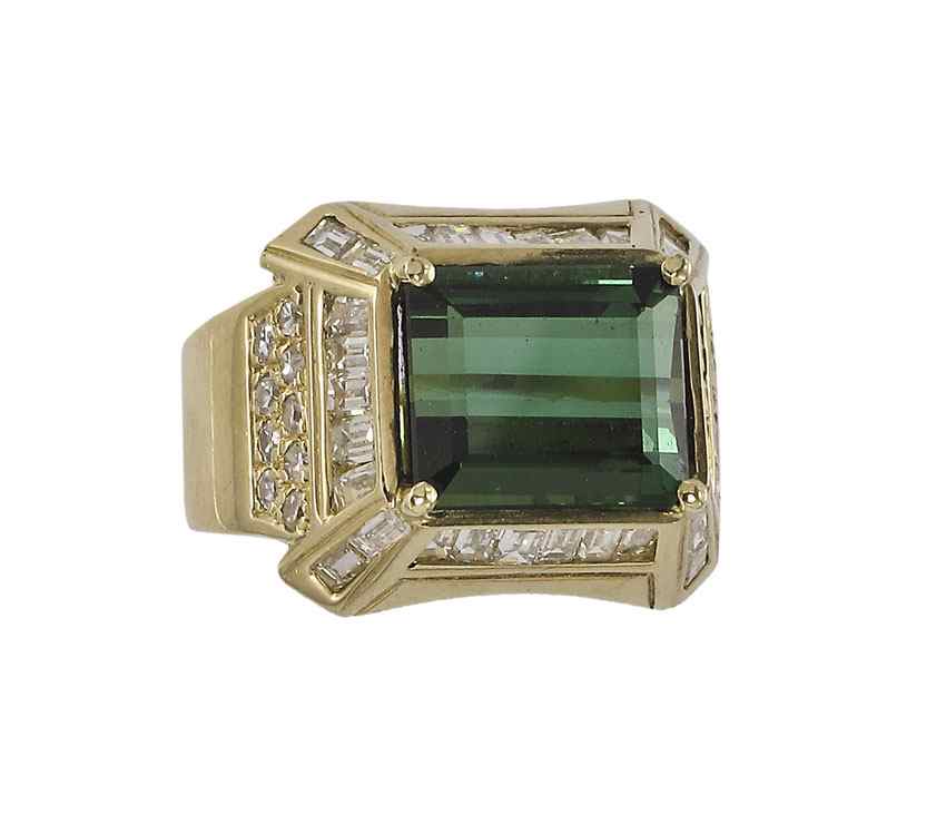 Appraisal: K GREEN TOURMALINE DIAMOND RING K yellow gold ring contains