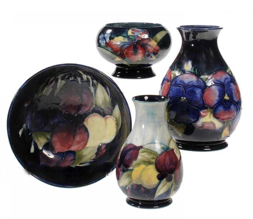 Appraisal: TWO MOORCROFT VASES AND TWO BOWLS DESIGNED BY WILLIAM MOORCROFT