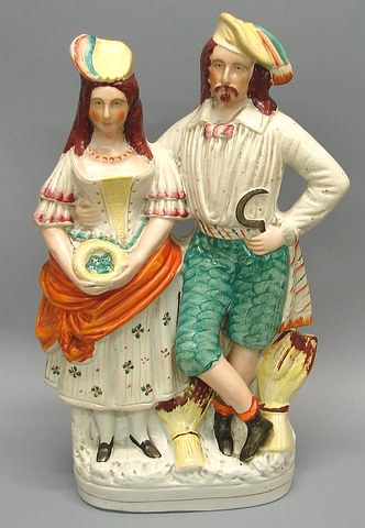 Appraisal: Lady holding eggs in nest and man holding sickle t