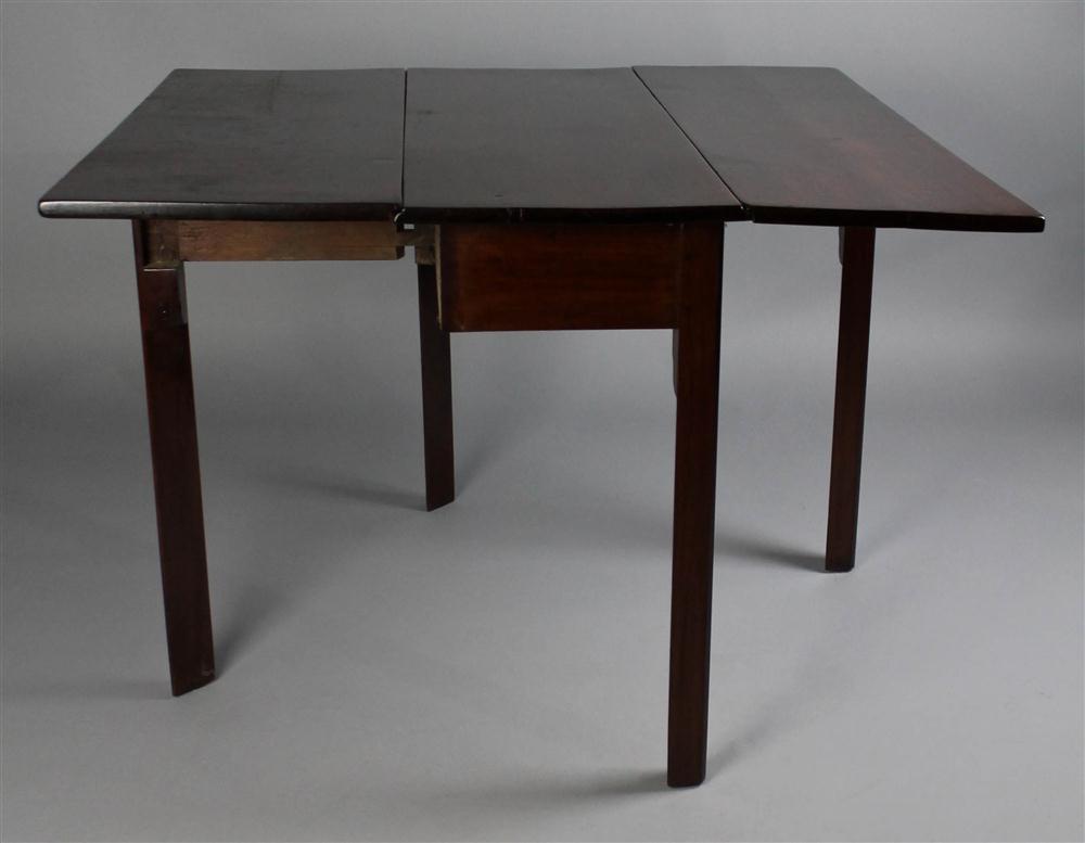 Appraisal: GEORGIAN MAHOGANY DROP LEAF TABLE having a rectangular top with