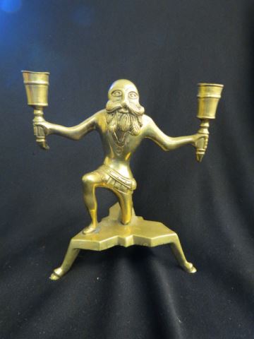 Appraisal: Brass Figural Candlabra older man holding torches hoof feet