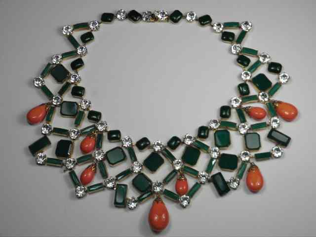 Appraisal: Kenneth Jay Lane bib necklace with green faceted glass rhinestones