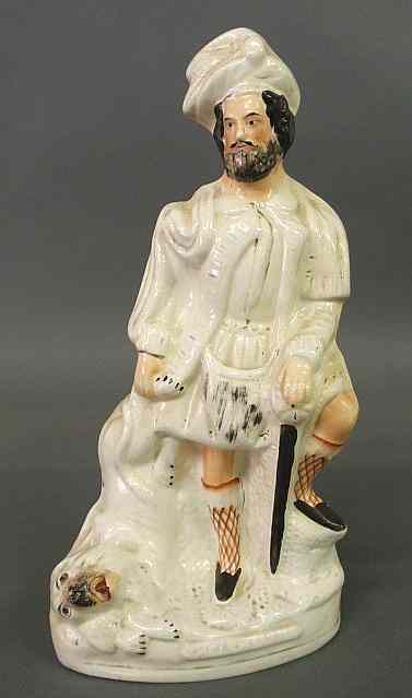 Appraisal: Staffordshire figure of a Highlander huntsman h