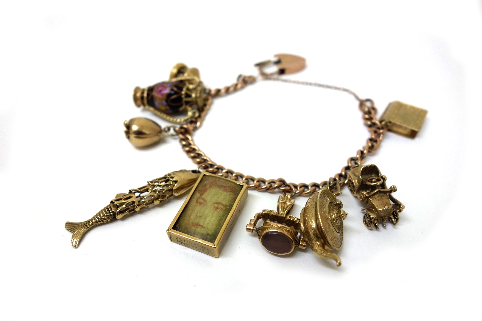 Appraisal: A ct gold curb link bracelet fitted with eight mostly