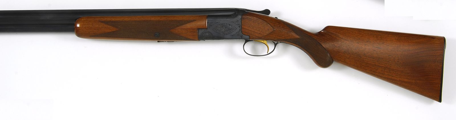 Appraisal: BROWNING OVER-AND-UNDER SHOTGUN ga Serial Belgian-made Blued finish Minor wear