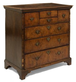 Appraisal: A GEORGE III WALNUT CHEST OF DRAWERS A GEORGE III