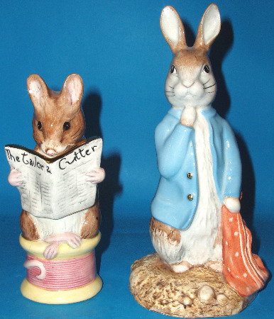 Appraisal: Large Size Pair of Figures Peter and the Red Pocket