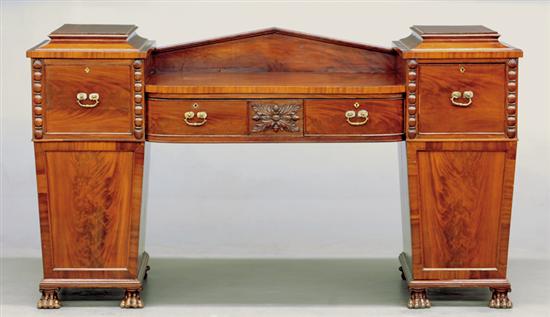 Appraisal: Late Georgian carved mahogany pedestal sideboard circa pediment-shaped backsplash above