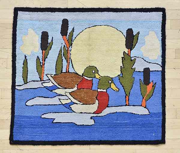 Appraisal: American hooked rug with mallard ducks th c x