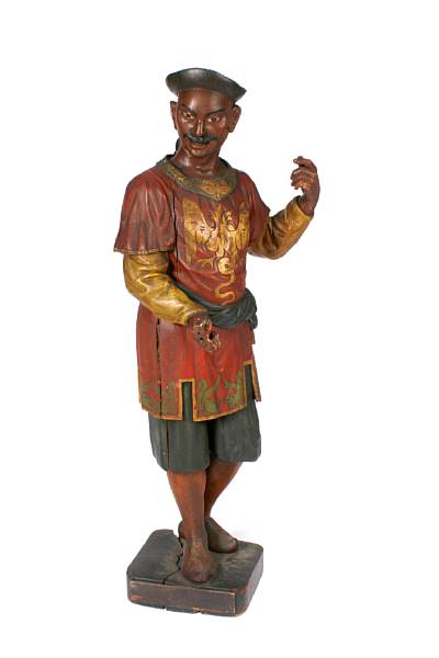 Appraisal: A carved wood and polychrome chinoiserie figure of a man