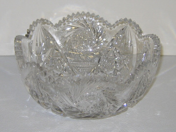 Appraisal: CUT GLASS BOWL With scalloped rim cut with spiraling and