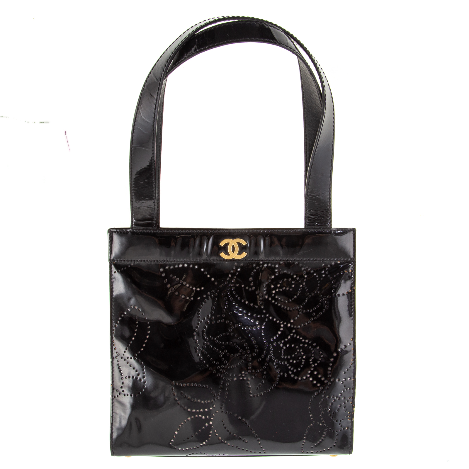 Appraisal: A CHANEL PERFORATED CAMELLIA MINI TOTE A black perforated patent