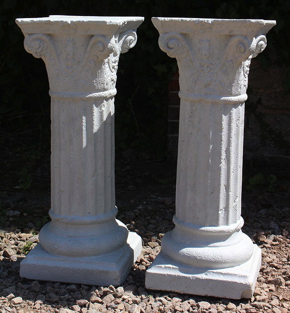 Appraisal: A PAIR OF PAINTED PLASTER PLINTHS of classic column design