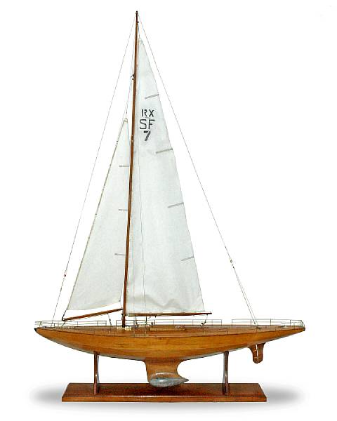 Appraisal: A sleek American mahogany and pine X-class free sailor sailboat