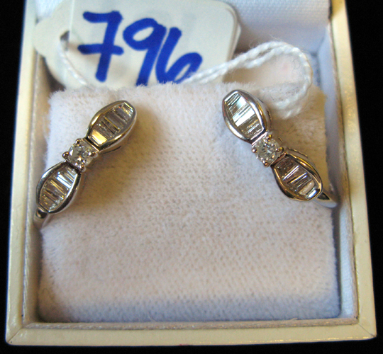 Appraisal: PAIR OF DIAMOND AND FOURTEEN KARAT WHITE GOLD EARRINGS each