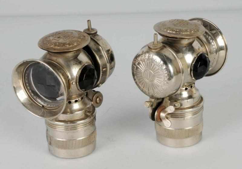 Appraisal: Pair of Nickel Over Brass Solar Carriage Lamps Description Dated